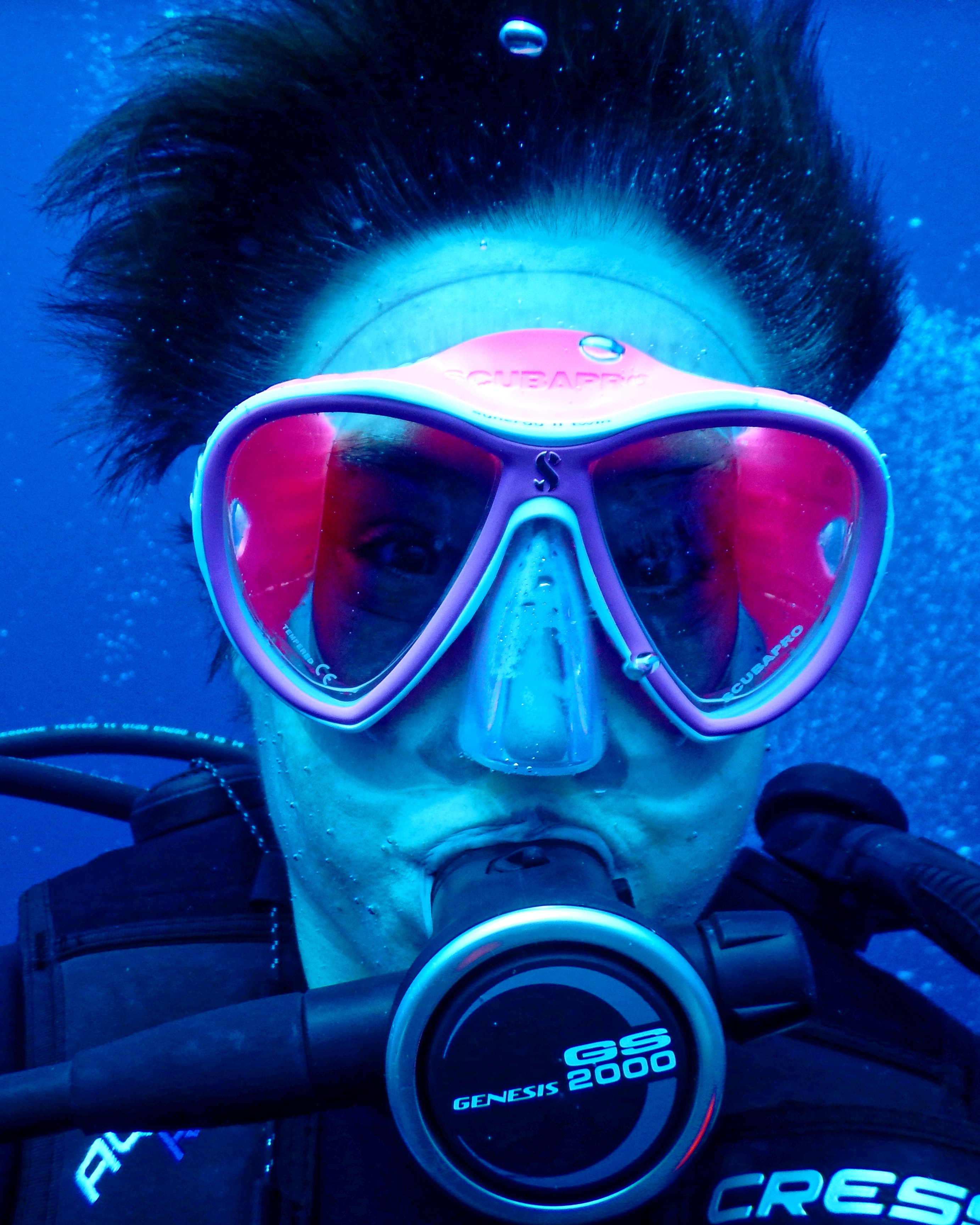 scuba diver entering water